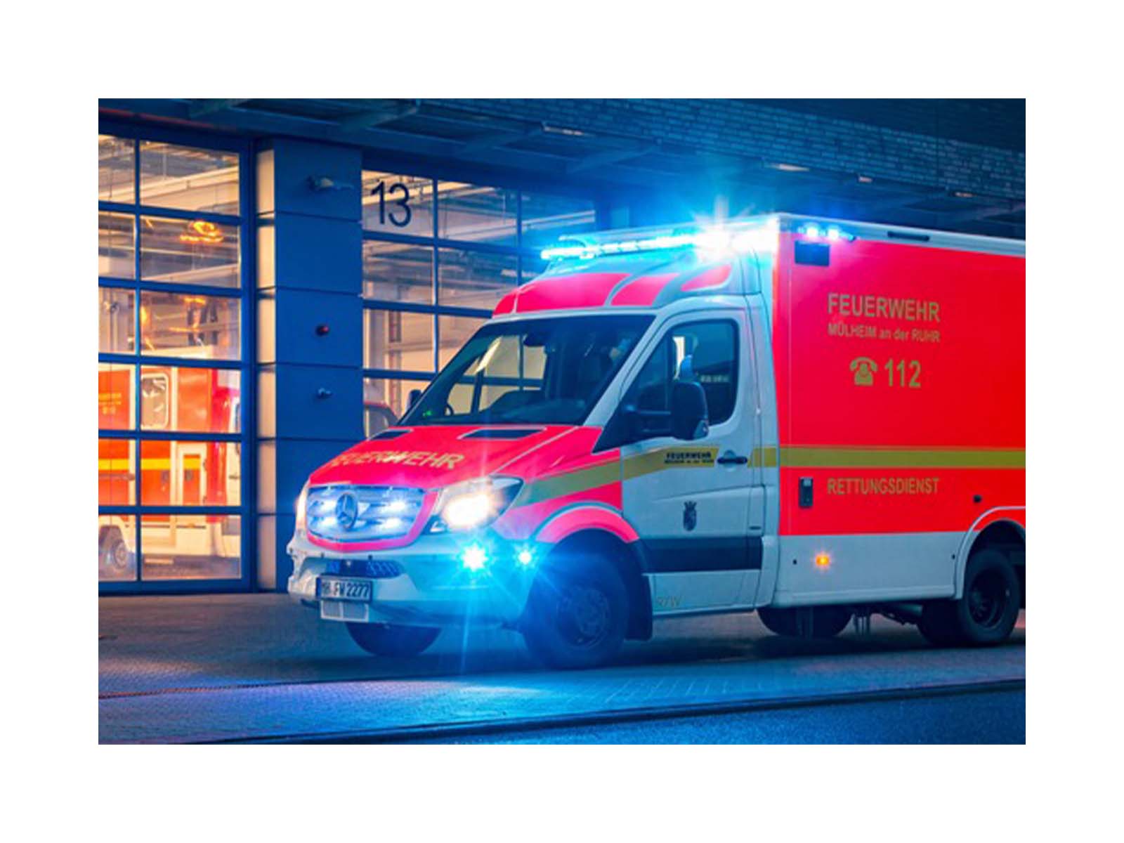 Intersection Light In Situ Blue Lit on Fire Vehicle